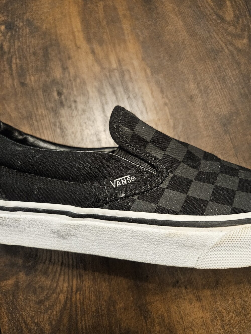 Vans Black and Gray Checkerboard Slip-On Sneakers